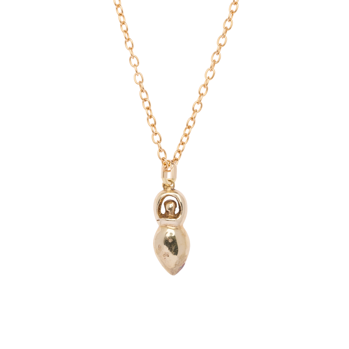 The Goddess Pendant from Madeleine Sculptural Jewellery is a gold chain necklace featuring a small, abstract, rounded pendant with a bulbous bottom and circular top, photographed on a white background.