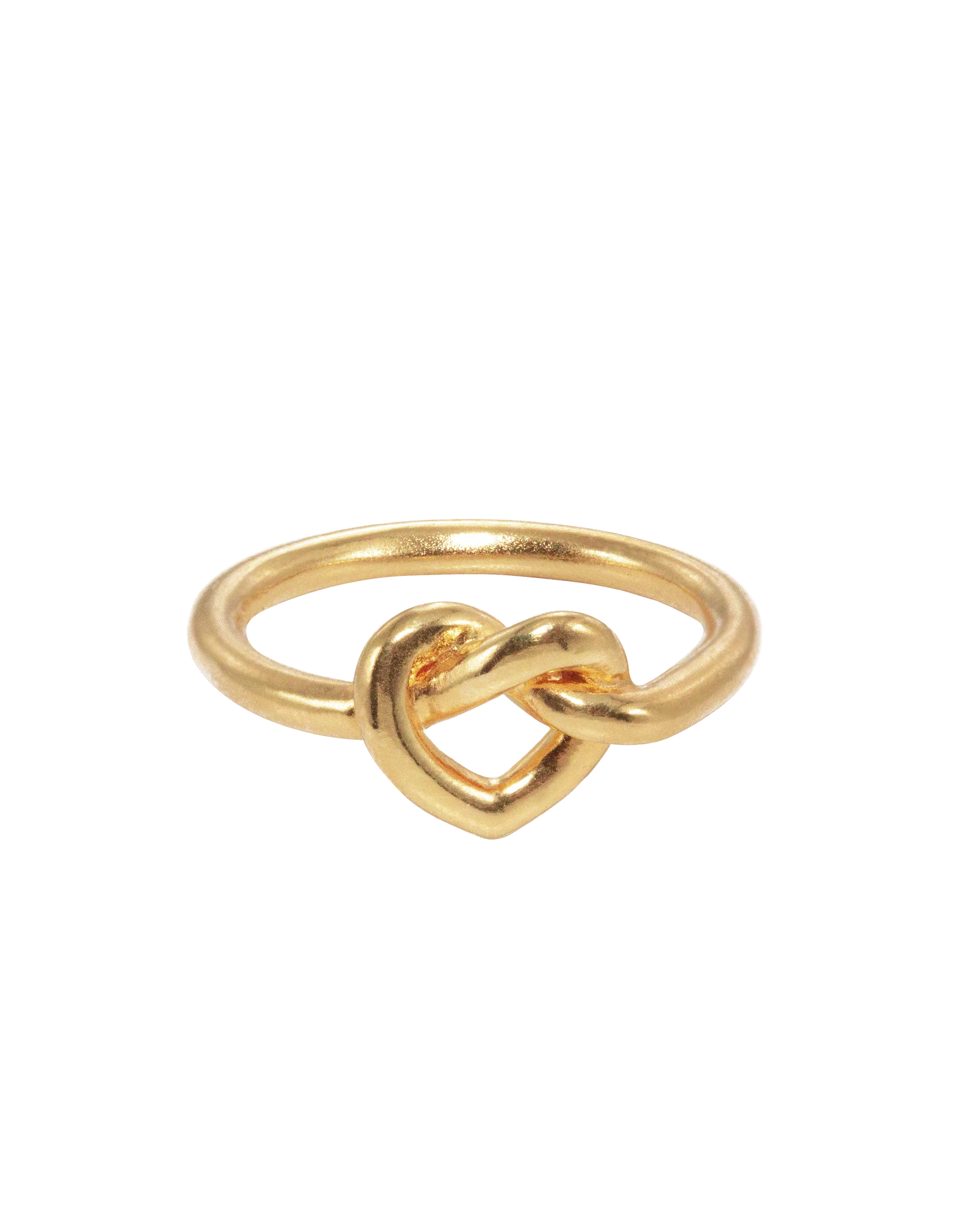 The Jane Koenig Tied Heart Ring is a gold ring with a heart-shaped knot design at the center, shown on a plain white background.