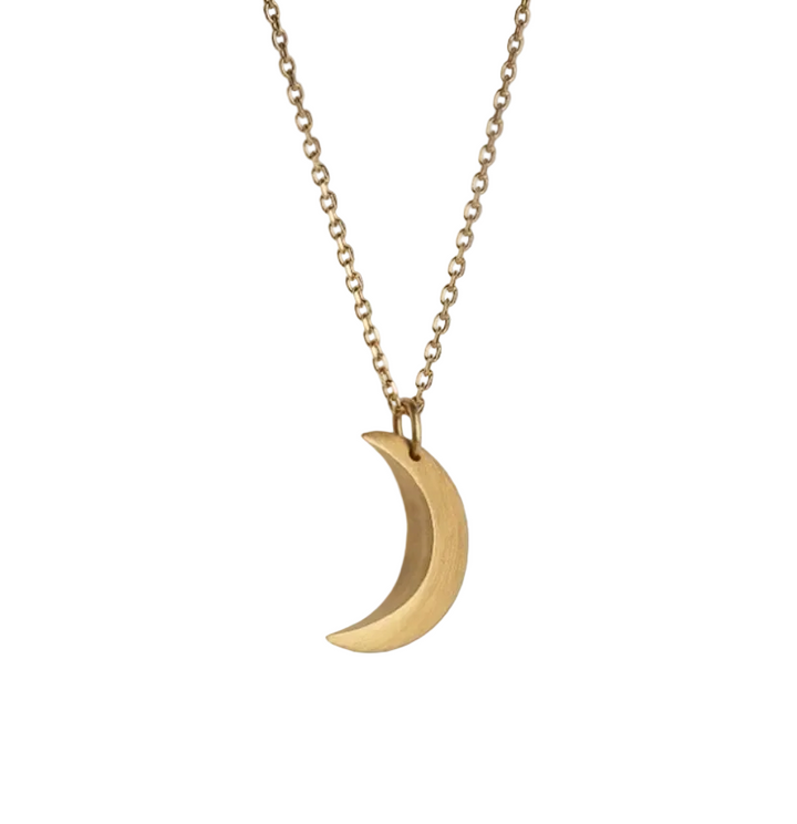 A gold crescent moon pendant necklace on a delicate gold chain, shown against a white background.