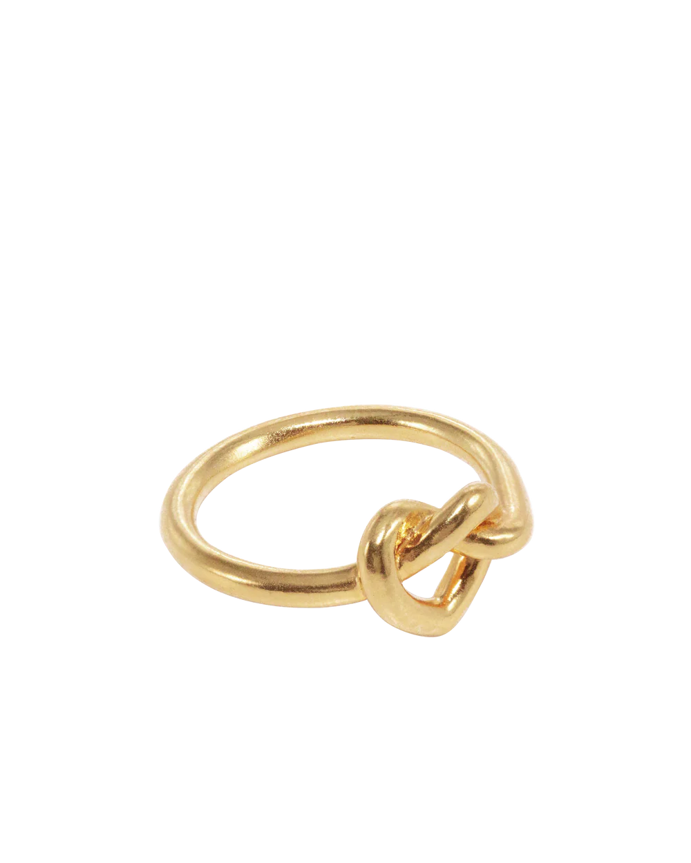 The Jane Koenig Tied Heart Ring is a gold ring with a simple knot detail at the center, shown on a plain white background.