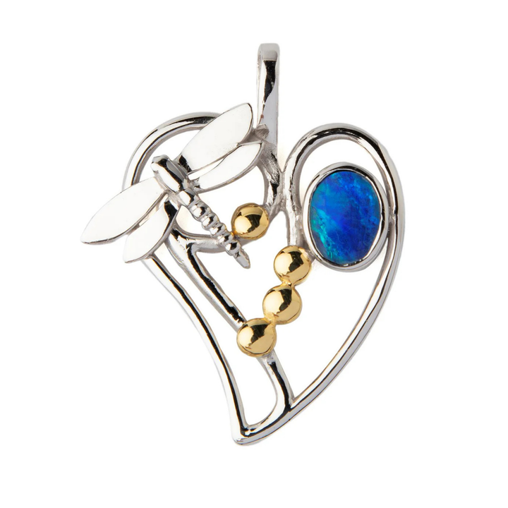 The Heart Dragonfly Pendant Small by Gallardo & Blaine Designs features a silver heart and dragonfly design, accented with three gold beads and an oval blue opal for a vibrant touch.