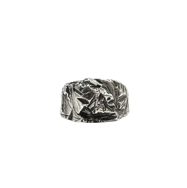 The Hephaestus Silver Ring by Inó Jewellery features a chunky, crumpled texture and rugged, uneven surface, making it a bold statement piece. Photographed against a plain white background.