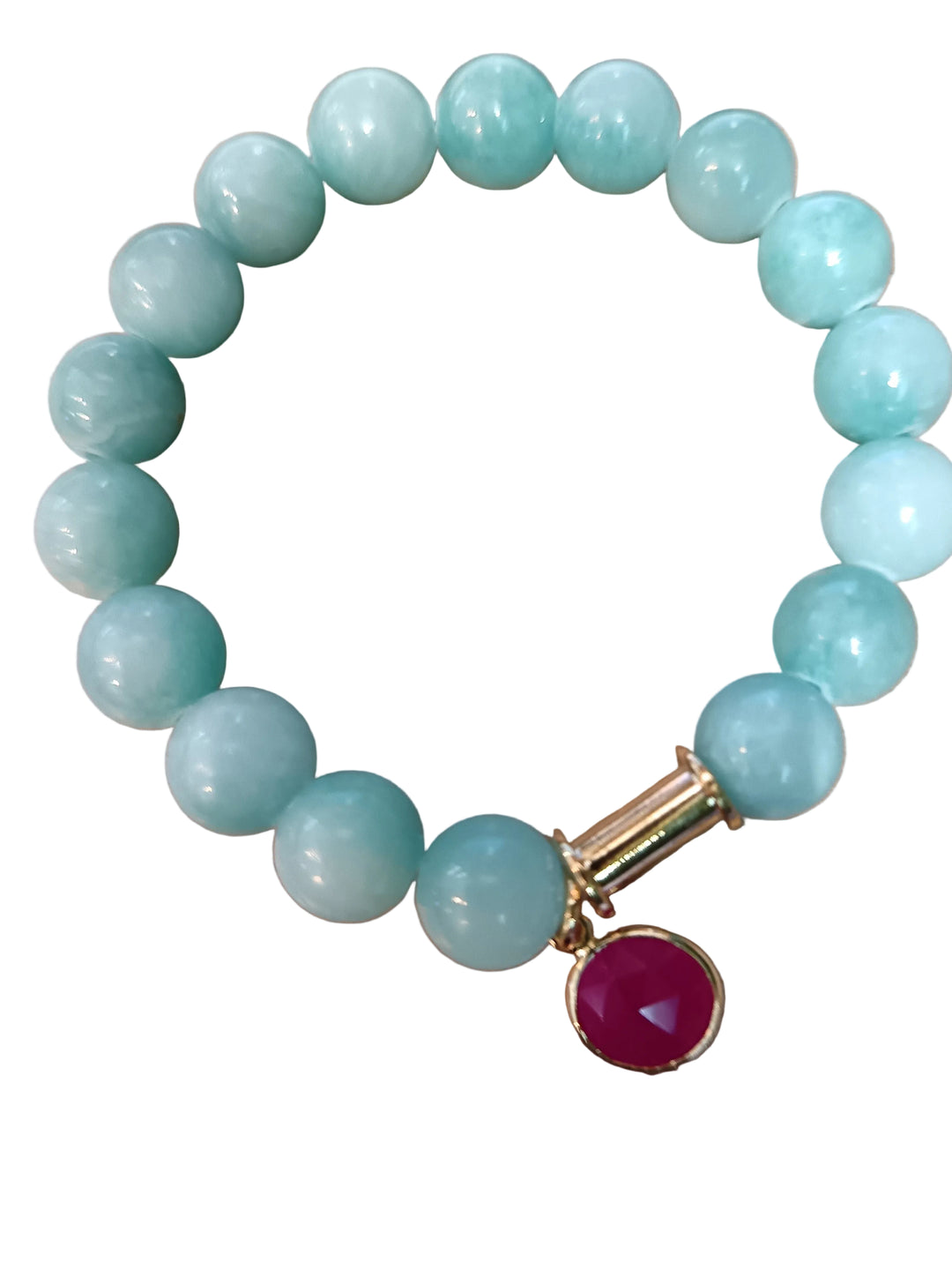 Aria V Soulstone Blue Chalcedony and Pink Chalcedony stretch bracelet featuring light blue beads, a gold-toned cylindrical spacer, and a dangling round pink stone charm, handmade in Dublin.