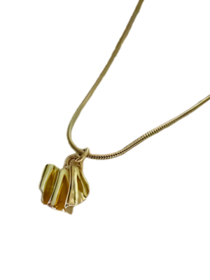 The Little Joy Necklace by Inner Island features a unique gold abstract pendant with folded, ribbon-like shapes, perfect for everyday wear. Shown on a white background.