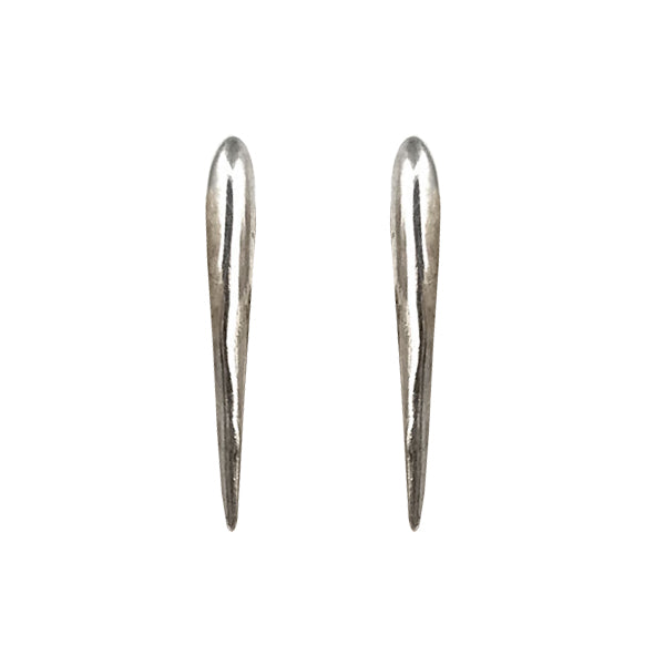 A pair of sleek Sea Urchin Spine Earrings - Gold by Jennifer Kinnear, featuring a smooth, tapered design in various sizes, are shown vertically on a plain white background.