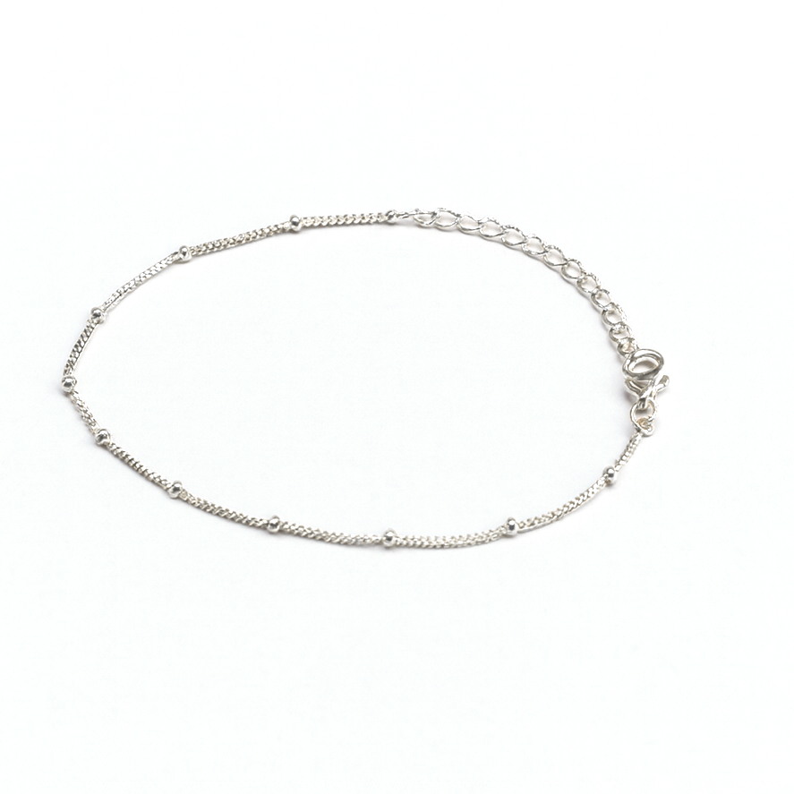 The Watermelon tropical Knot Chain Bracelet is a sterling silver anklet with evenly spaced small beads and an adjustable clasp, shown on a white background.