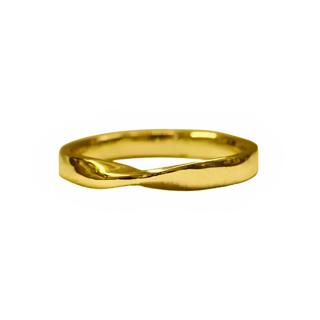 A close-up image of a simple yellow gold twist shape ring. The ring has a smooth finish with a subtle twist design. The background is white, highlighting the reflective surface of this made-to-order Knot Wedding Ring by The Collective Dublin.