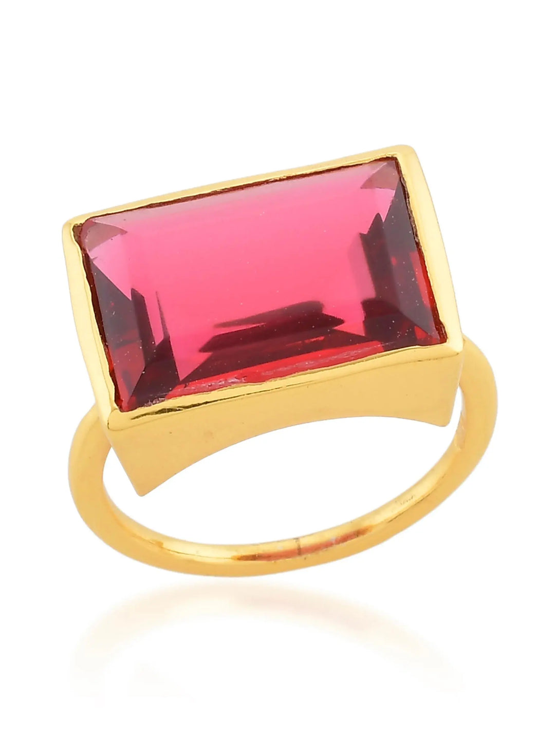 The Lenny Ring by Shyla features a large, rectangular red gemstone set on a simple gold band, displayed against a white background.