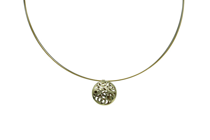 A delicate gold necklace with a simple thin chain and an intricate round 9ct yellow gold pendant featuring an elegant cut-out design. The pendant appears to be of a floral or abstract pattern, adding a touch of sophistication to the piece, reminiscent of an Irish countryside pendant. The background is plain white. This is the Líos Small Gold Pendant on Gold Plated Steel Cable by Miriam Wade.