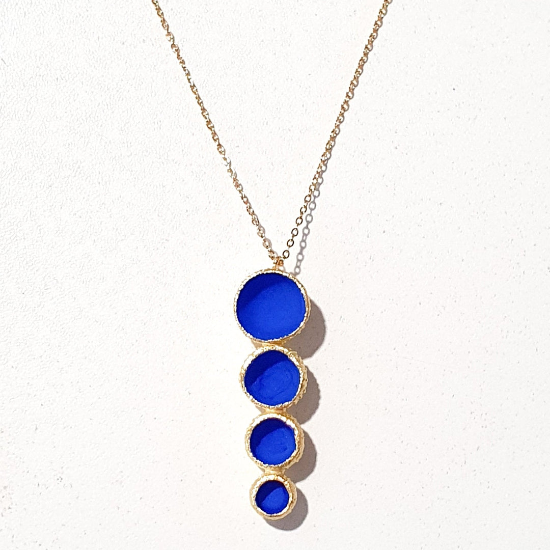 Long necklace with matt quadruple Cobalt Blue or Matt Black cupules on gold plated silver and a 35" gold plated chain.