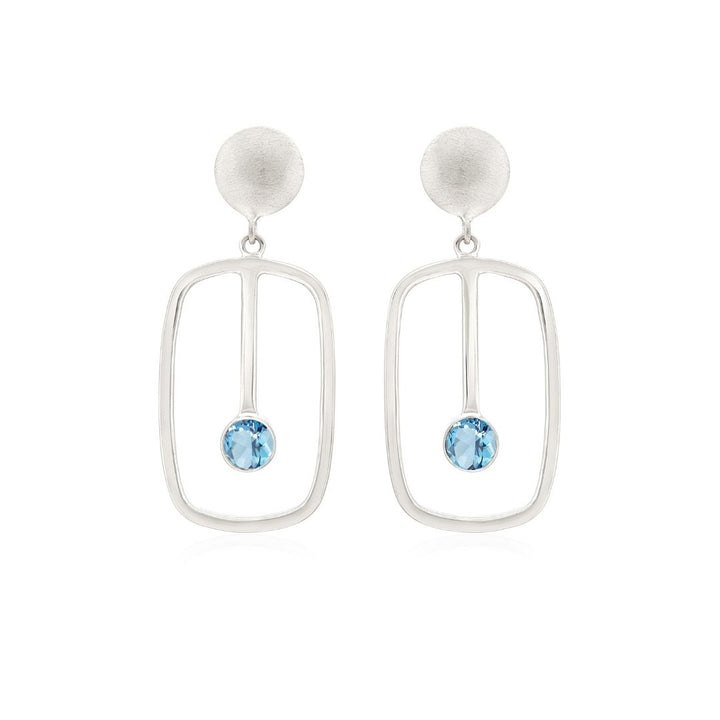 Gallardo & Blaine Designs' Lorelei Earrings Small feature an open rectangular design in sterling silver with a vertical bar and a center Blue Topaz, topped with round silver studs. These earrings add sophistication to any outfit.