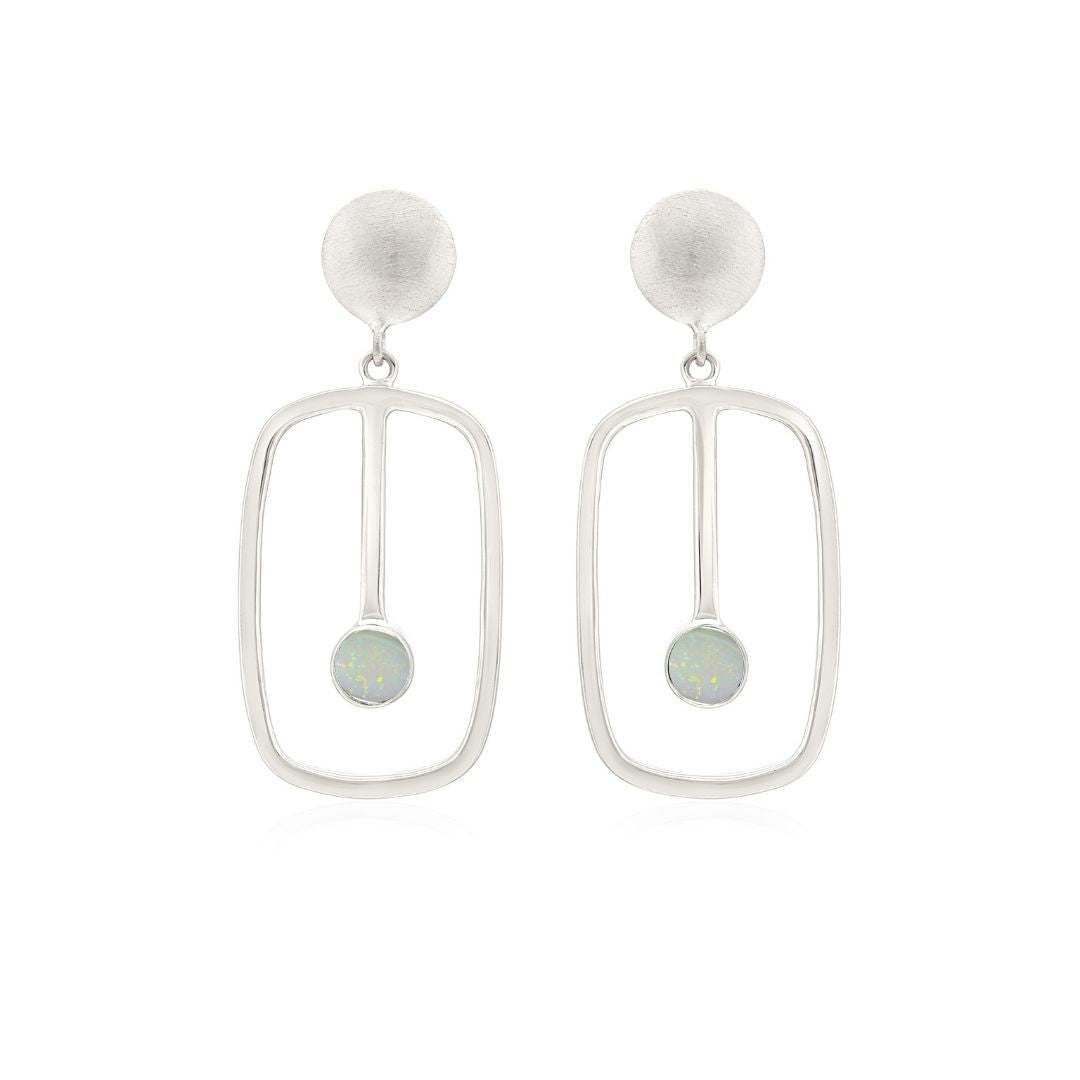 Introducing the Lorelei Earrings Small from Gallardo & Blaine Designs: Sterling silver drops featuring a brushed circular stud above an open rectangular frame, with a dangling sphere displaying a pastel iridescent finish for an ethereal touch. Available in various gemstones.