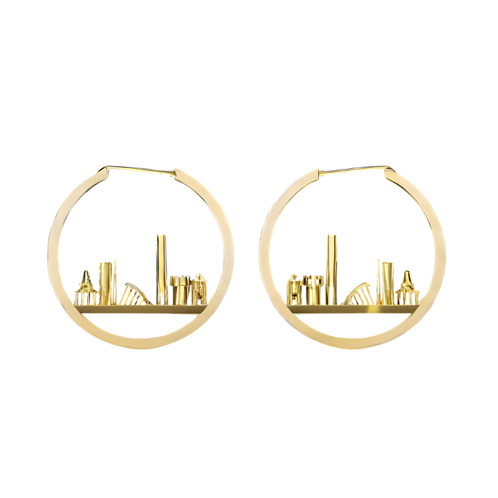 The Horizon of Dublin Hoops by Madeleine Sculptural Jewellery feature a cut-out cityscape with geometric detailing, highlighting sustainable craftsmanship and a unique handcrafted design.