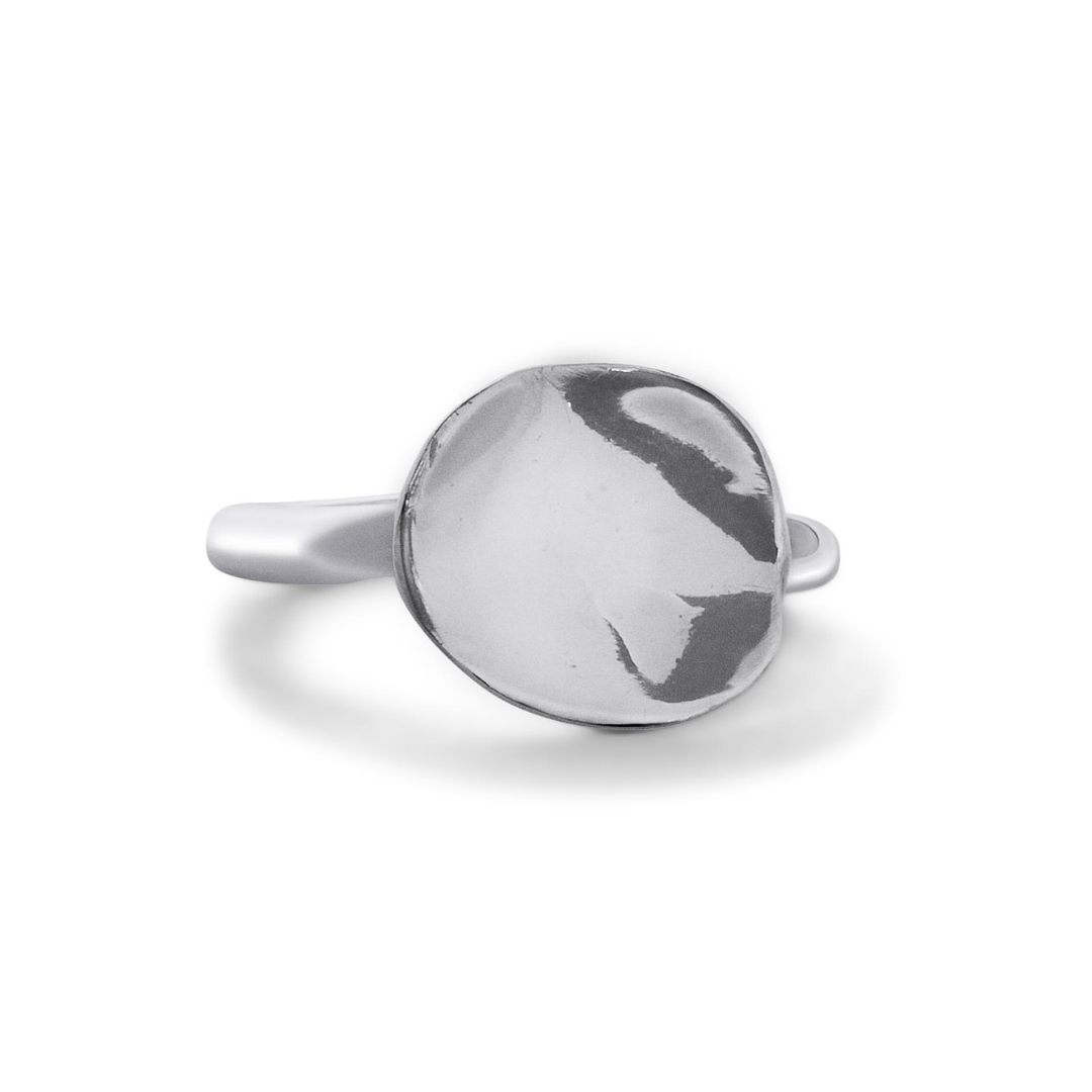 The Tide Ring by Madeleine Sculptural Jewellery features a round, highly polished, slightly domed silver disc at its center, set on a smooth and simple band.