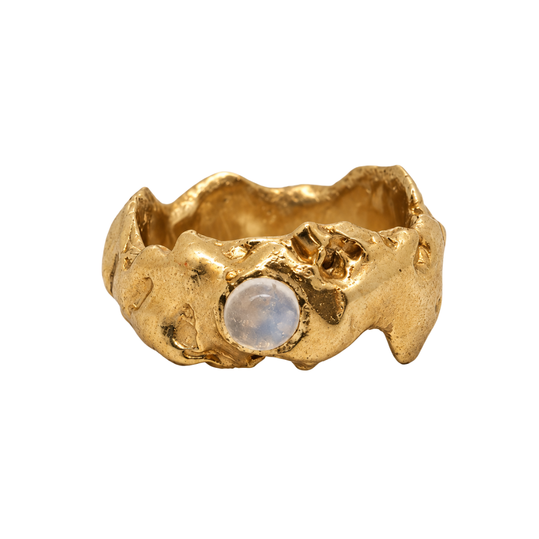Element Ring with Moonstone Small: a gold brass ring with an uneven, organic texture featuring a round, iridescent moonstone cabochon.