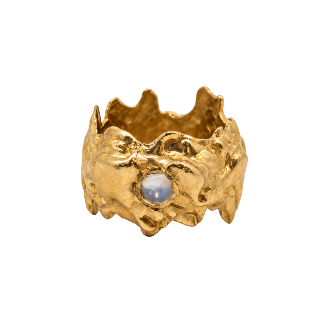 Madeleine Blaine Siol Ring with Moonstone, featuring a gold brass band with an uneven, organic texture and a single embedded moonstone.