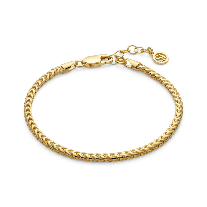 The Sif Jacobs Muro Bracelet Gold features a gold-plated finish, lobster clasp, adjustable extender, and a small round charm—an elegant piece of demi-fine jewelry displayed on a white background.
