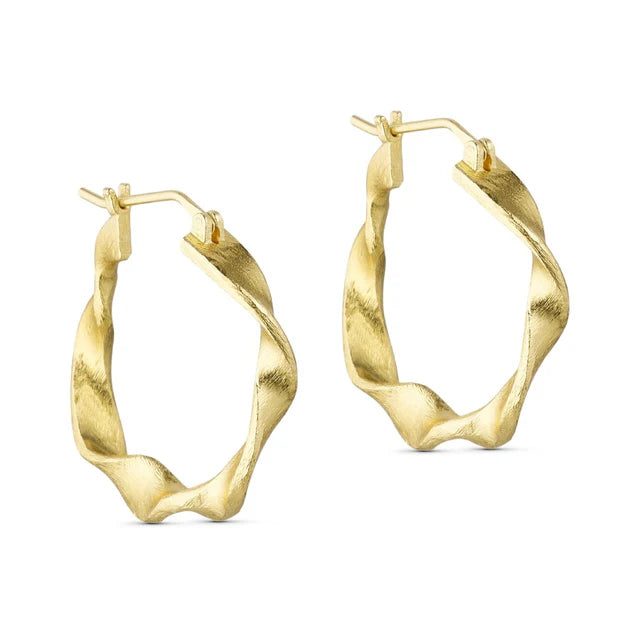 The Maeve Gold Hoops by Watermelon tropical are 24K gold-plated brass earrings with a twisted, wavy design and hinged clasps, displayed against a white background.