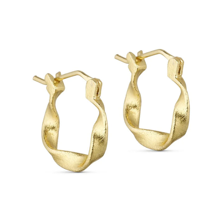 Maeve Gold Hoops by Watermelon tropical: small, handmade gold-plated brass earrings with a twisted, irregular geometric shape and brushed texture, shown on a white background.