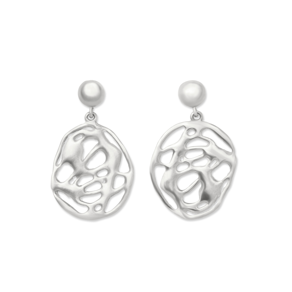 The Molten Drop Earrings by Madeleine Sculptural Jewellery feature silver round studs with organic, abstract openwork dangles inspired by freeform patterns.