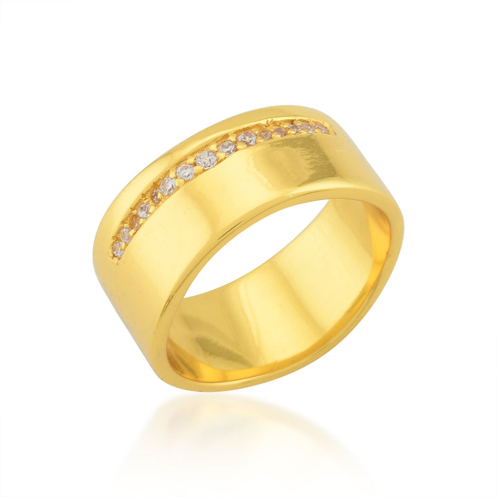 A wide gold chunky band with a smooth, shiny finish, known as the Nobu Ring by Shyla, is adorned with a diagonal row of small crystals embedded along its surface. The ring is photographed against a plain white background.