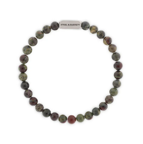 The Steel and Barnett Natural Ned 6mm Round Gemstone Bracelet features earthy-toned dragon blood stones and a silver rectangular accent engraved with the brand name for unique character.