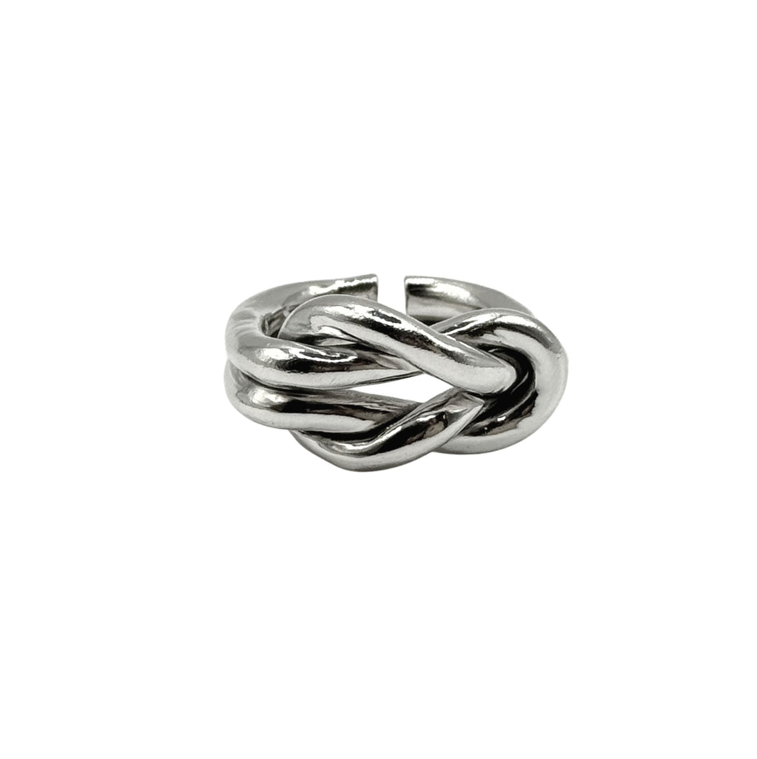 The Nautical Knot Ring by Inó Jewellery is a handcrafted chunky sterling silver ring with a twisted knot center and open back, shown on a plain white background.