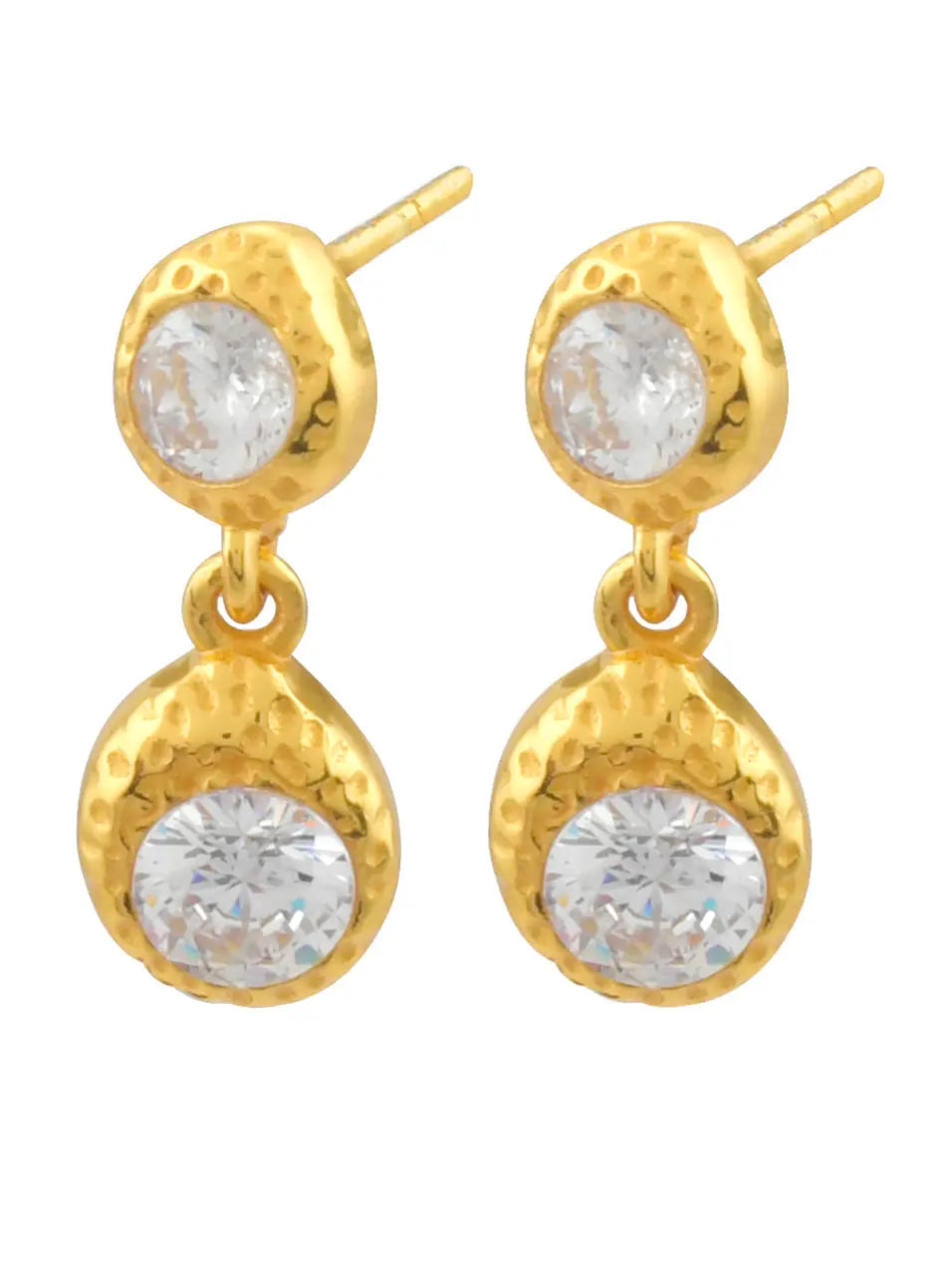 Shyla’s Odessa Earrings feature a hammered gold plated finish and two round clear crystals—one small at the top and a larger gem suspended below.