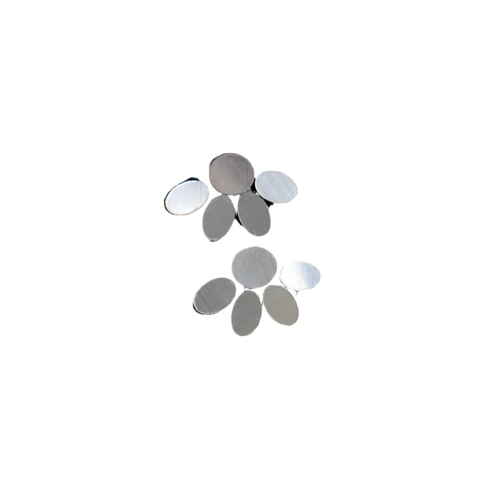 Displayed on a textured white stone, the Organic Reflections Earring Small Silver by Iskin Sisters features modern and elegant minimalist daisy shapes with brushed metal finishes. The earrings' small circular and oval petals create a sophisticated look against the light, neutral background.