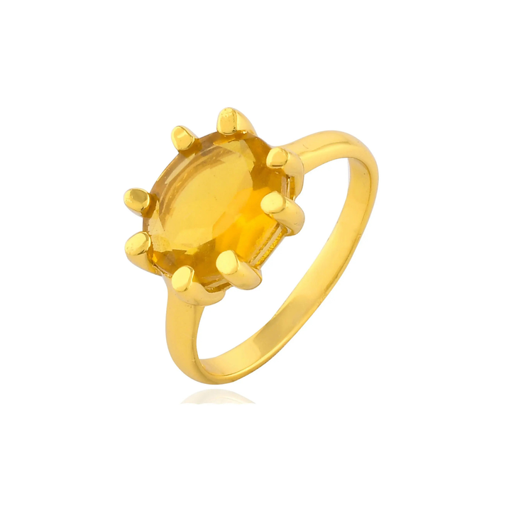 The Shyla Oval Claw Ring in various colours is a gold-on-sterling silver statement piece with an oval gemstone secured by eight prongs, shown on a white background.