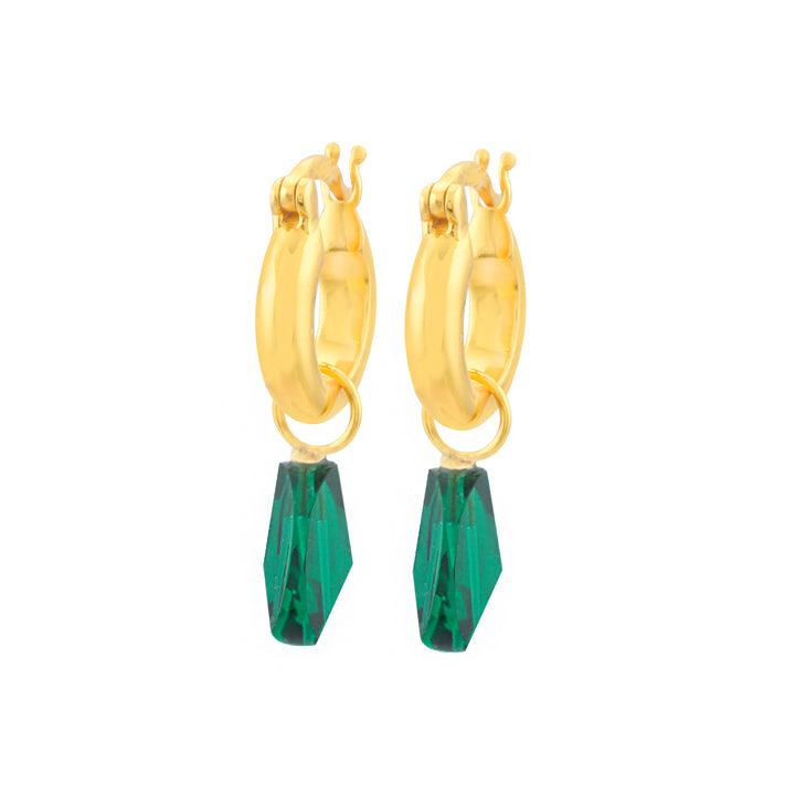 Introducing the Shyla Priya Earrings, a stunning pair of gold on sterling silver hoops with green gemstone pendants. The faceted gemstones are cut in a geometric shape, adding elegance to the shiny, smooth gold hoops. Plus, these earrings are hypoallergenic for your comfort and peace of mind.