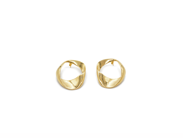 A pair of Paula Curved Earrings (Small) by Bonvo, displayed against a plain white background. The link style earrings are shiny, catching the light, and have a contemporary, sculptural appearance.