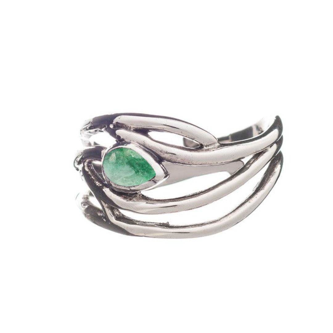 Gallardo & Blaine Designs' Peacock Ring features intertwined sterling silver bands and a central teardrop-shaped green gemstone, with an intricate and elegant design reminiscent of graceful curves wrapping around the gem.