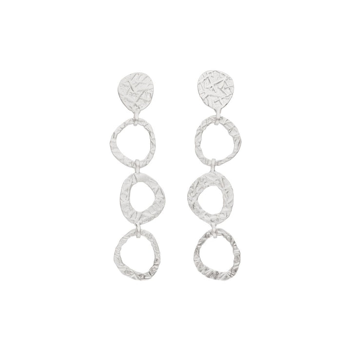 The Tezer Silver Circular Dangle Stud Earrings feature three textured, interconnected oval loops and a textured oval stud at the top. These striking sterling silver earrings present an elegant, asymmetric oval silhouette—perfect for those who love contemporary statement jewelry.