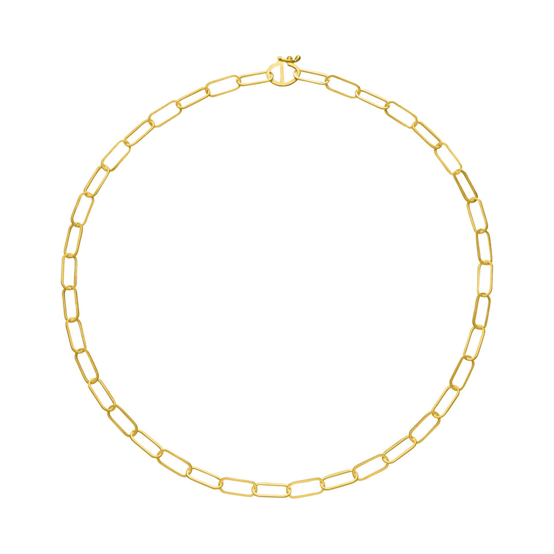 The Tezer Small Paperclip Link Bracelet features elongated, rectangular links arranged in a circle with a simple clasp at the top. Reminiscent of a classic paperclip design, this elegant piece stands out beautifully against the plain white background.