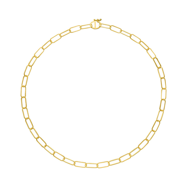 The Tezer Small Paperclip Link Bracelet features elongated, rectangular links arranged in a circle with a simple clasp at the top. Reminiscent of a classic paperclip design, this elegant piece stands out beautifully against the plain white background.