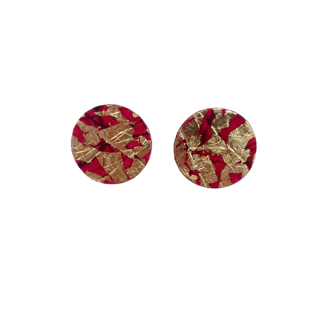 Rothlú's Ró Sgraffito Stud Earrings in Red/Black feature a red background with irregular gold foil accents and sterling silver posts for a unique, textured look.