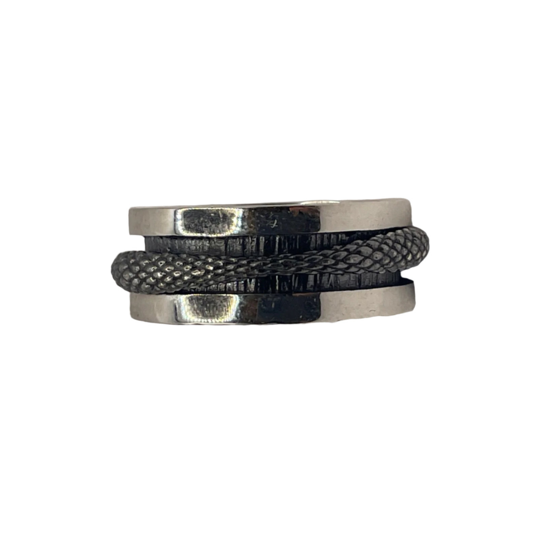 The K.And Scaled Texture Silver Spinner Ring features a bold, modern sterling silver band with a dark, snake-like scaled design—perfect as stylish stress relief fidget jewellery.