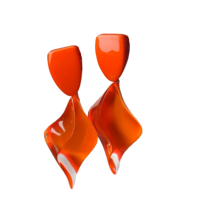 The MX.design Acrylic Fluorescent Orange Genie Earrings feature a modern, abstract sculptural shape with a shiny, wavy design, displayed on a white background.