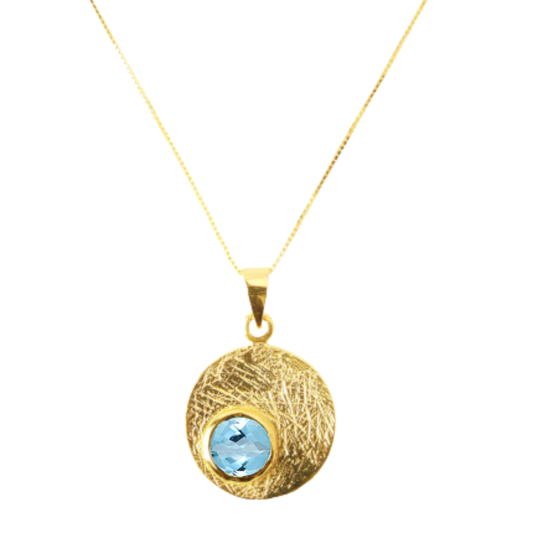 The Selene Necklace Gold - Small by Gallardo & Blaine Designs features a round, textured pendant with your choice of gemstone, set on a delicate gold-plated chain.
