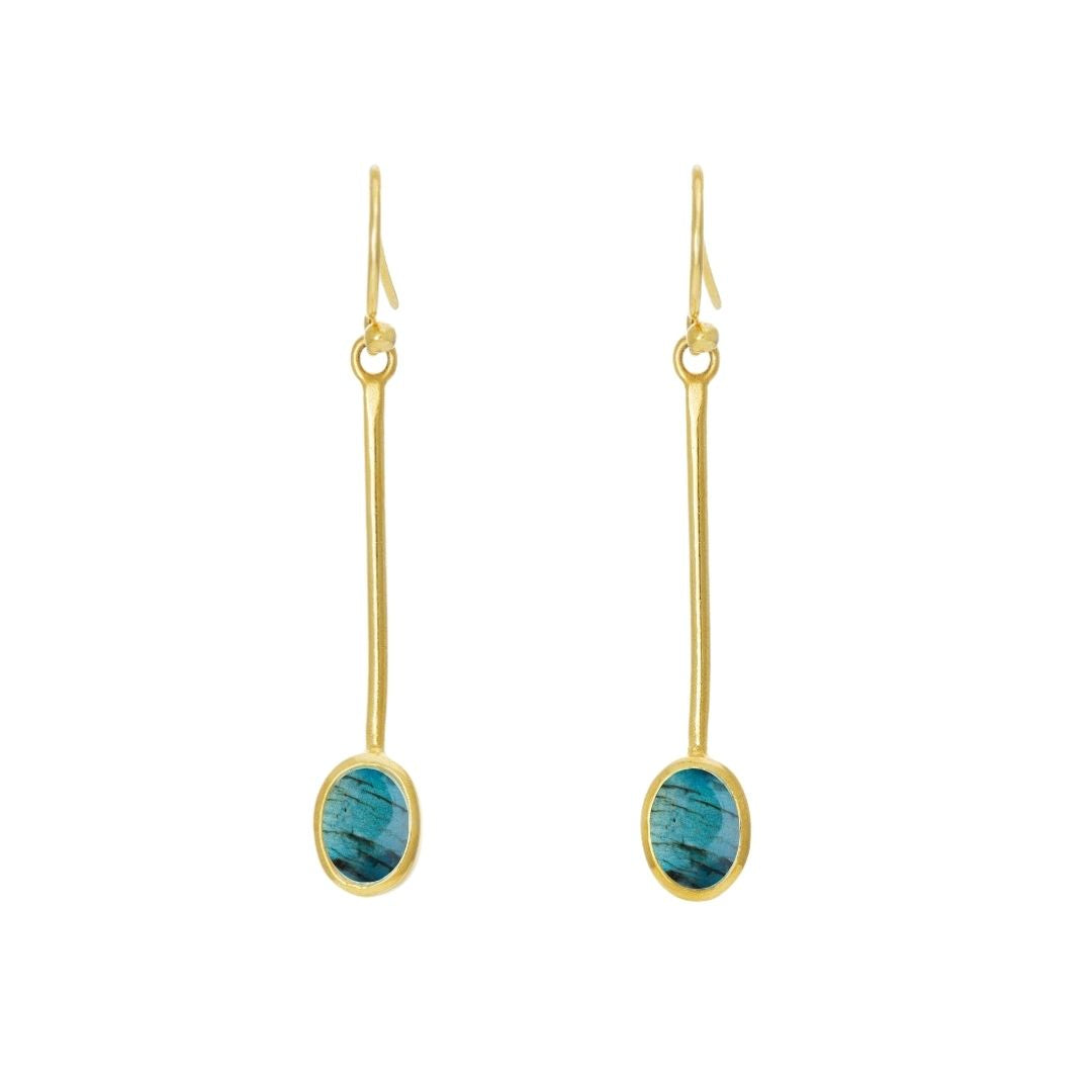 The Sequola Earrings by Gallardo & Blaine Designs feature long, slender gold bars with oval turquoise gemstones, exuding timeless charm.