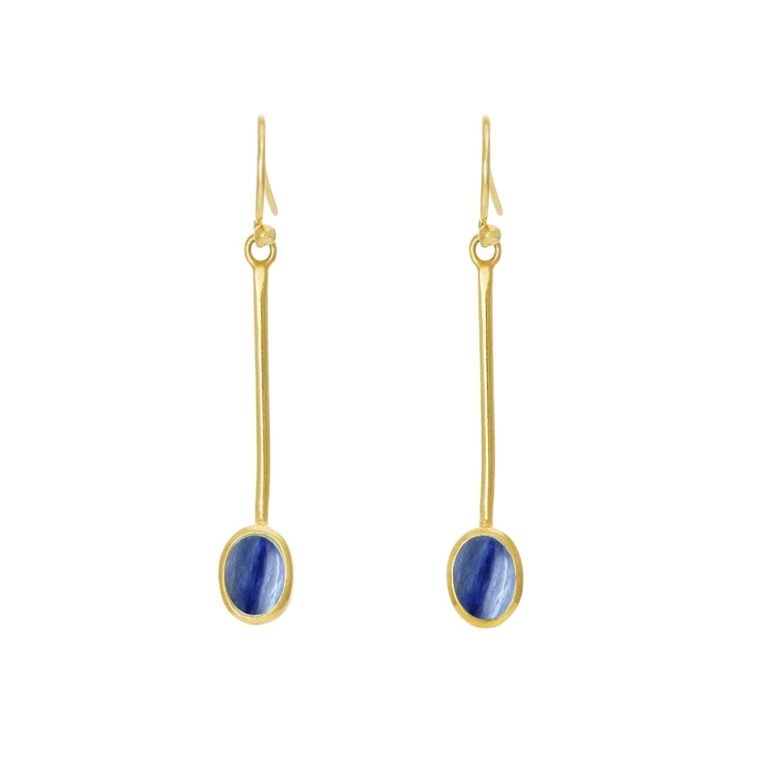 The Sequola Earrings by Gallardo & Blaine Designs exude timeless charm with long gold rods and oval blue gemstones.