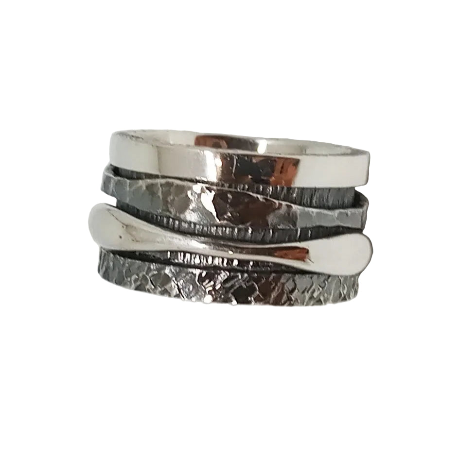 The K.And Silver & Oxidised Double Spinner Ring features multiple stacked bands with smooth, hammered, and curved textures, displayed against a white background.