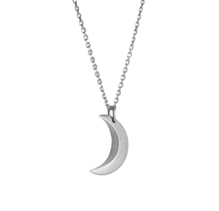 A silver crescent moon pendant necklace on a delicate silver chain, shown against a white background.