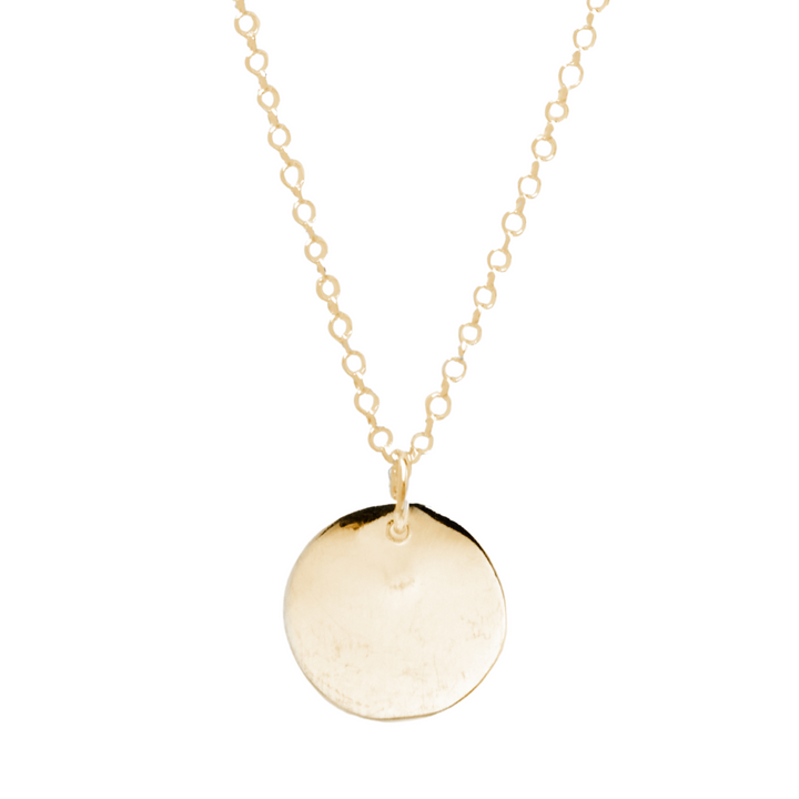 The Simple Disc Pendant by Personalised Charms features a delicate gold-plated disc on a fine oval link chain—a simple, elegant necklace that adds a subtle shine to any outfit.