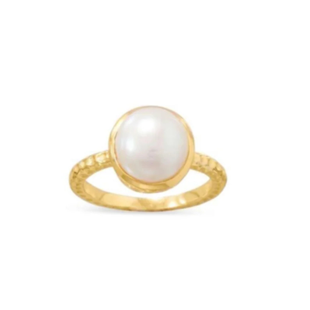 Gold plated, textured, ring with simple round pearl in gold plated bezel