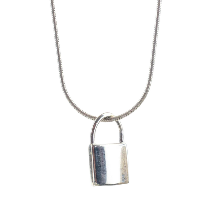 The Small Sterling Silver Lock by Engravable Jewellery features a delicate silver lock pendant on a fine sterling silver chain, shown against a plain white background.