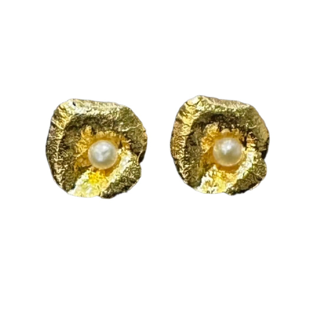Small gold plated studs in a petal shape. Pearl placed at centre of petal.