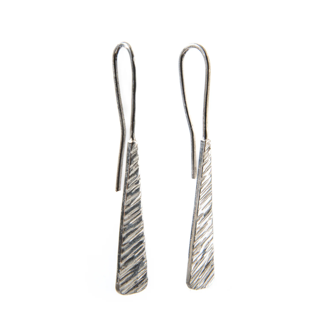 Teardrop shaped long silver earrings with texture and hook back