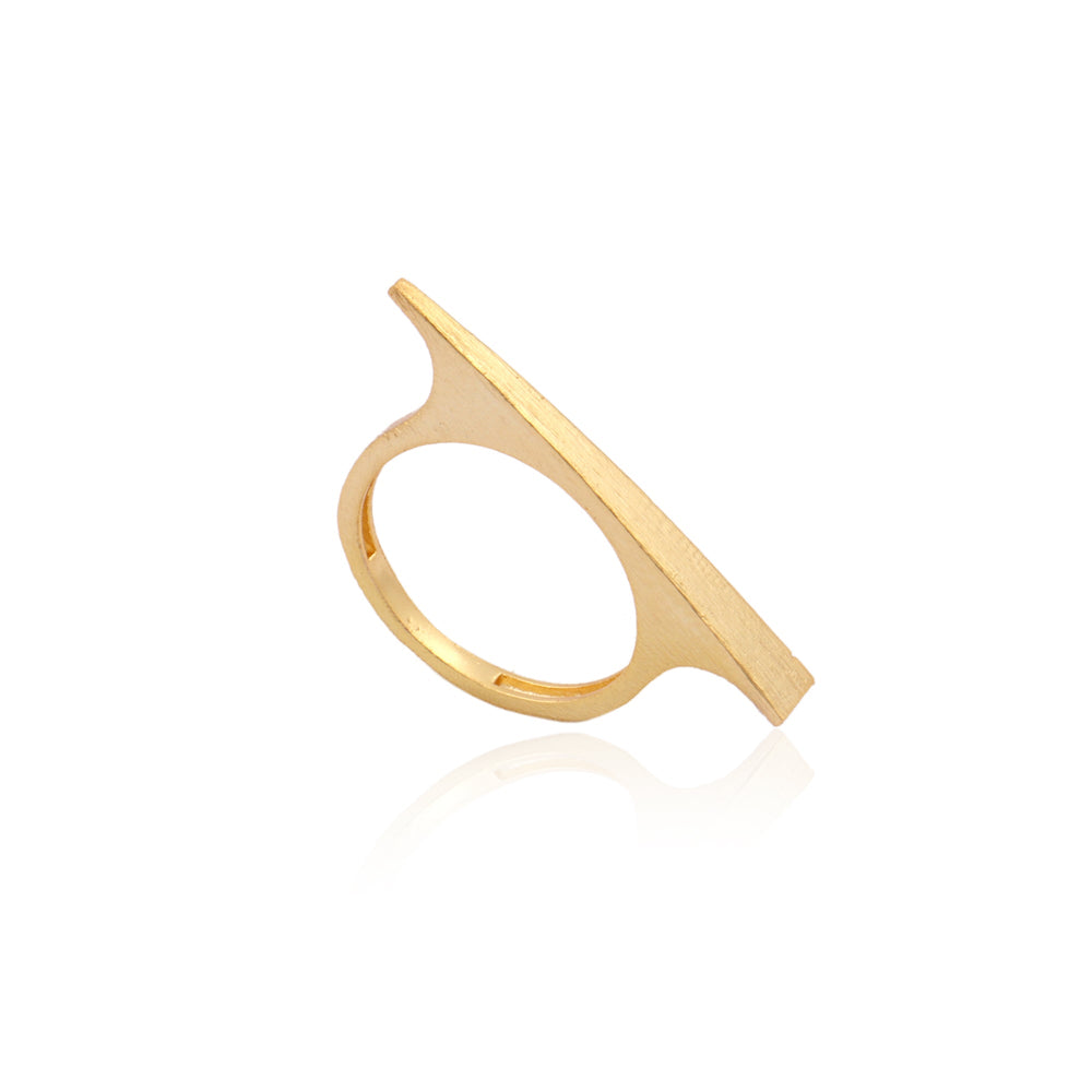 A modern, minimalist bar ring on a white background. The Trixie Gold Ring by Watermelon Tropical, featuring a thin band and a unique flat, horizontal bar extending across the top, is plated in thick gold for a sleek and contemporary design.